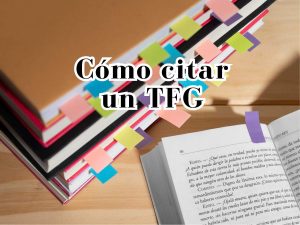 Guía sobre cómo citar un TFG correctamente, imagen con libro abierto y marcadores de colores.
